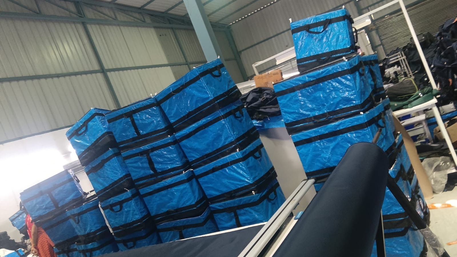 Zentara production floor — finished logistics bags staged for dispatch